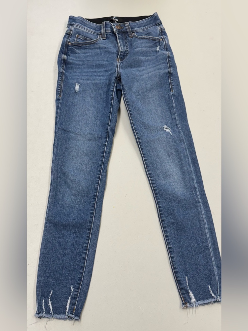 LuLaRoe Women’s Skinny Jeans in Light Blue Distressed Denim with magic waistband